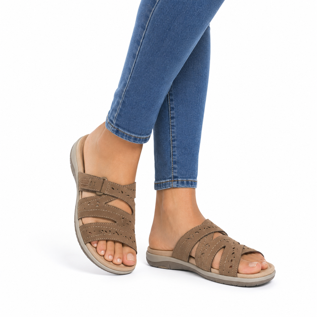 Orthopedic women's sandals with secure adjustable straps for all-day comfort & support.