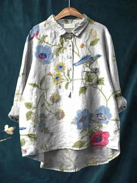 Elegant women's long sleeve floral blouse, showcasing its vibrant print. Versatile for daily & special wear.