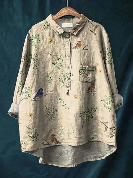 Stylish women's floral blouse, showing elegant print details. Comfortable long sleeve top for daily wear.
