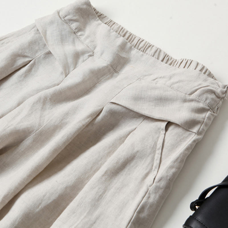 Effortless style: women's high-waist wide-leg trousers, a spring fashion essential.