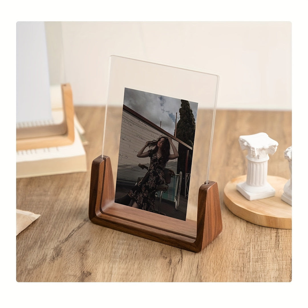 Modern 6-inch clear acrylic picture frame with a minimalist wood base, vertical or horizontal.