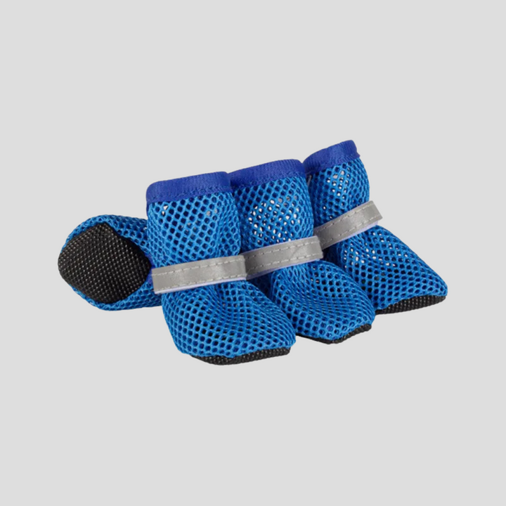Close-up of anti-slip sole on pet paw protector shoes, ensuring grip for dogs and cats. Safety footwear.