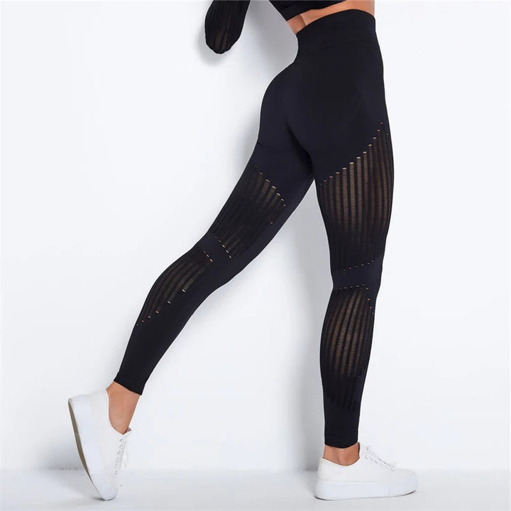 Sleek women's high-waist sculpting seamless leggings for flattering support during fitness & athletic activities.
