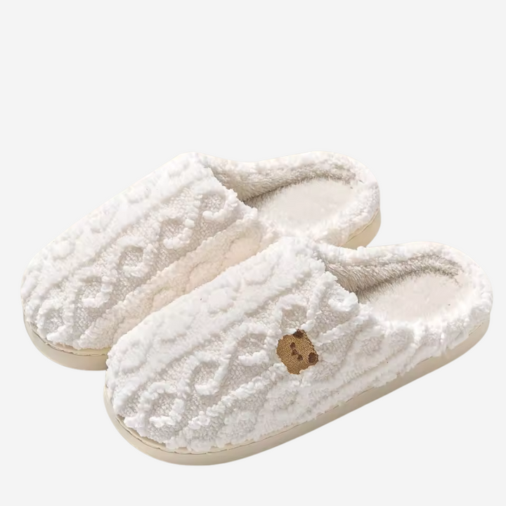Soft teddy bear style plush slippers for women, offering ultimate cozy comfort & warm feet indoors.