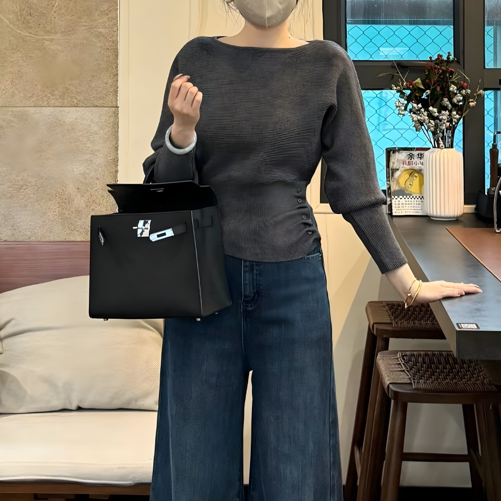 Stylish women's off-shoulder batwing sweater for chic comfort, a must-have for fall & winter style.