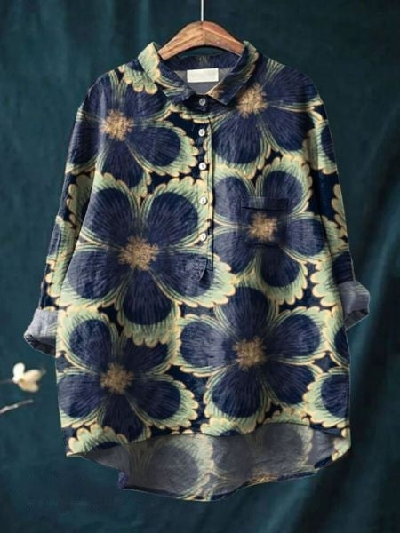 Detail of elegant long sleeves on a women's floral print blouse. Chic & comfortable daily wear top.