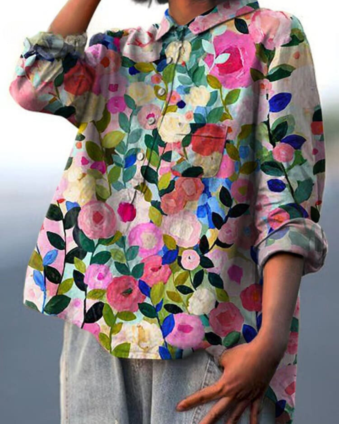 Women's flowy floral print blouse for an elegant daily wear outfit. Versatile long sleeve top for spring.