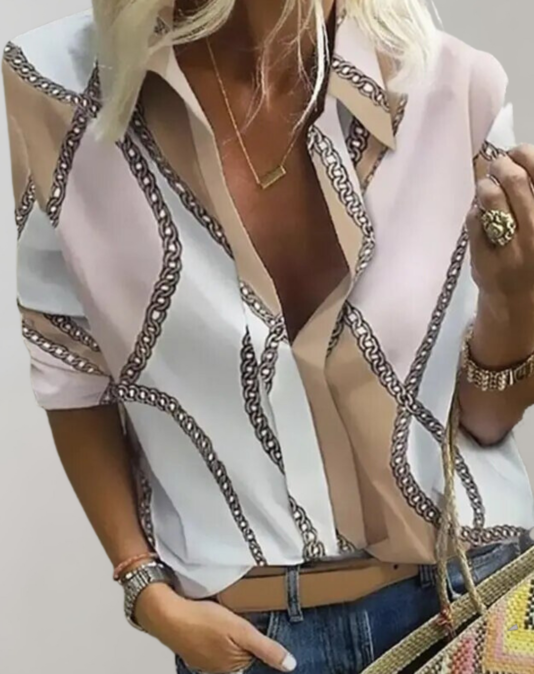 Versatile women's chain pattern blouse, a stylish long sleeve top for formal occasions or everyday chic fashion.