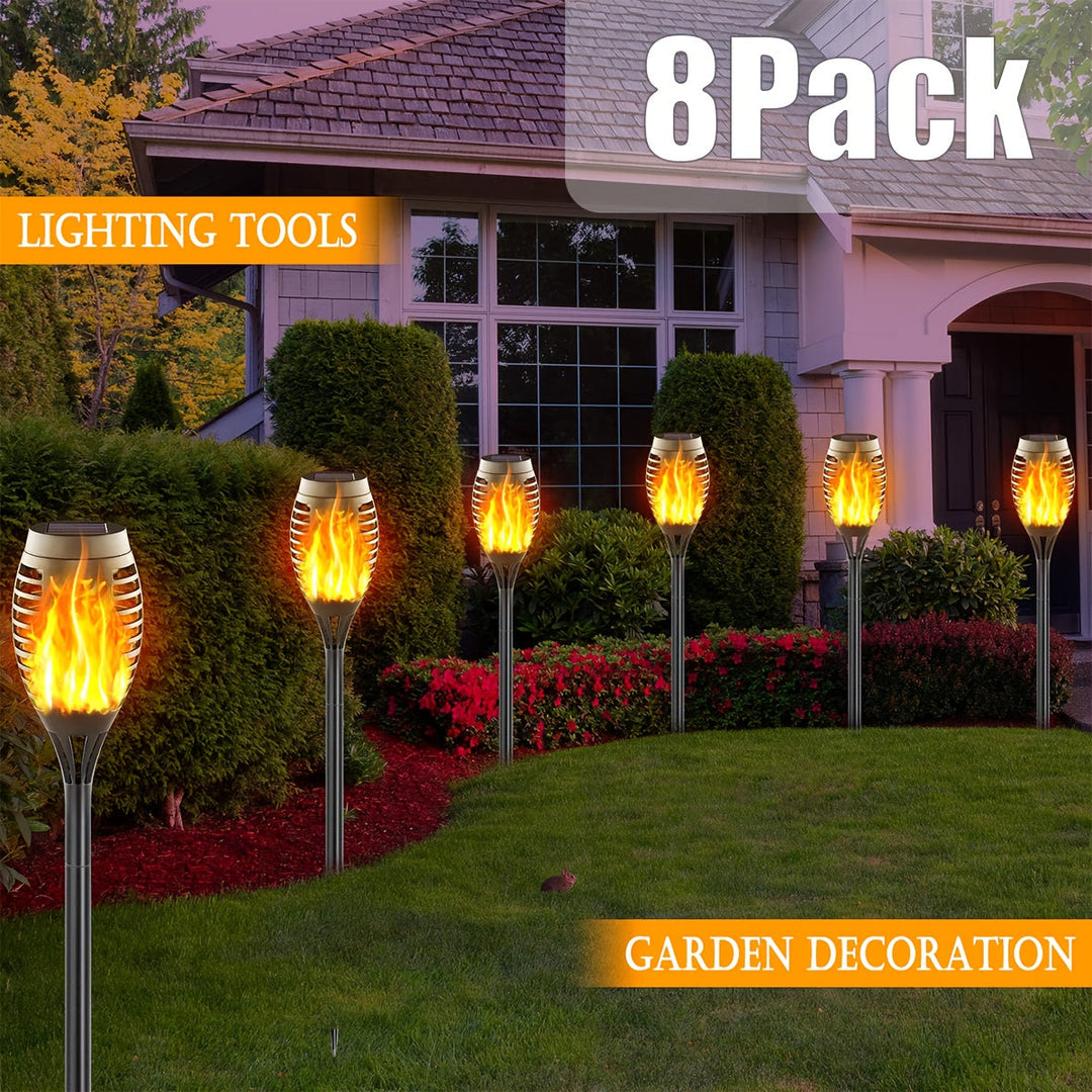 Durable outdoor solar lights, 8-pack, providing wireless flame effect landscape lighting.
