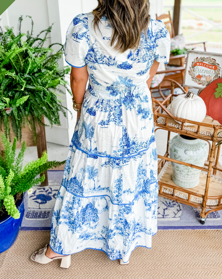 Casual yet elegant women's toile maxi dress. Comfortable smocked waist and classic V-neck for everyday wear.