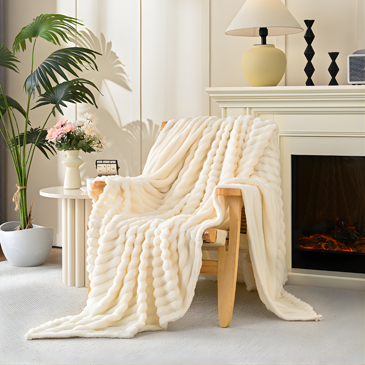 Soft faux fur throw blanket, luxurious polyester, perfect for cozy home comfort & decorative accent.