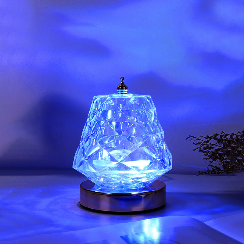 Vibrant ocean wave projector lamp with adjustable LED light. Transforms room into a tranquil ocean experience.