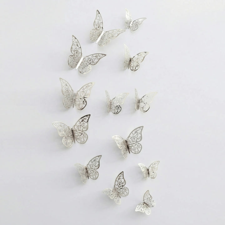 Shiny metallic 3D wall butterflies. Removable decorative stickers for a modern home or party decor.