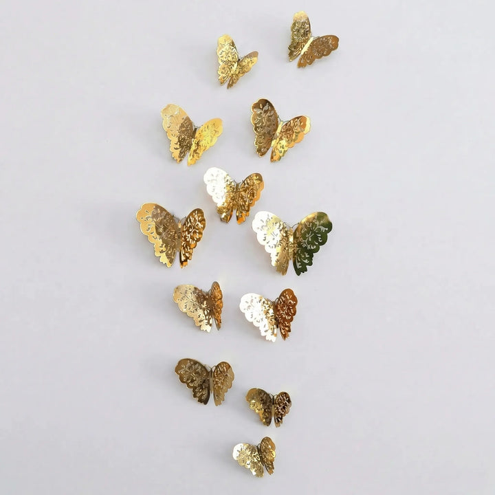 Elegant 3D butterfly wall art. Metallic gold & silver decorative stickers for modern home accents and style.