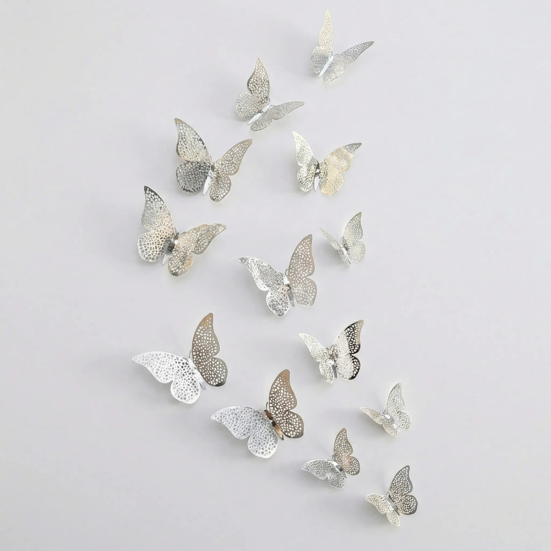 Set of 3D metallic wall butterflies for DIY home decor. Removable decorative stickers for easy application.