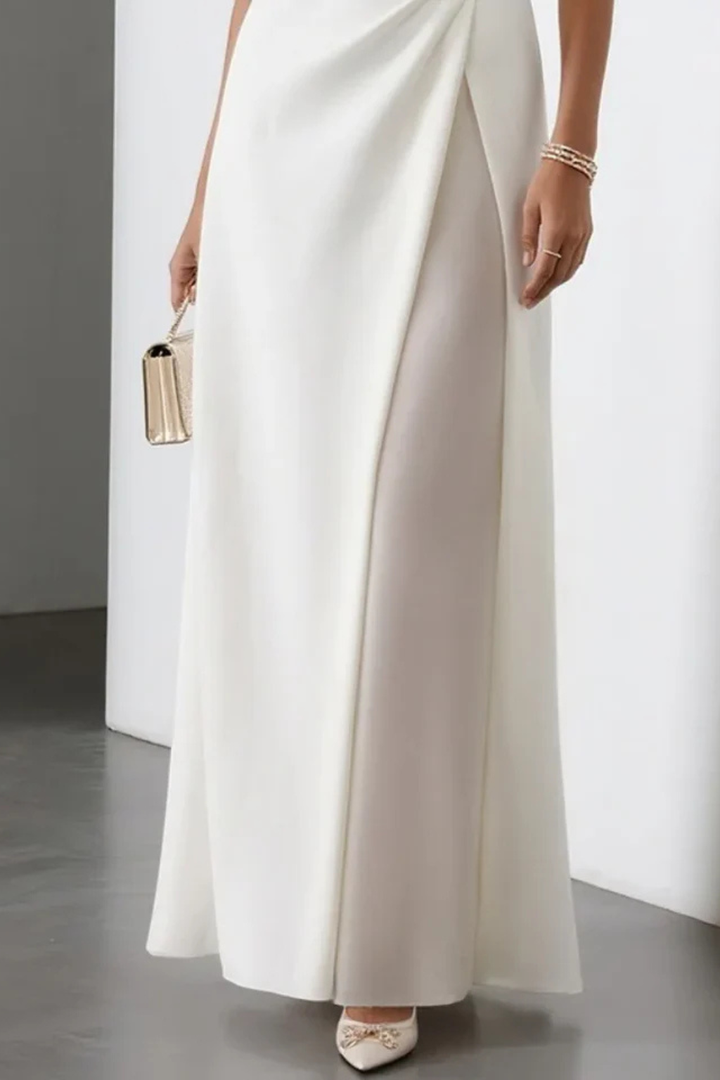 Women's graceful maxi dress, sleeveless with a beautiful side slit & draped waist, ideal as a party or formal dress.