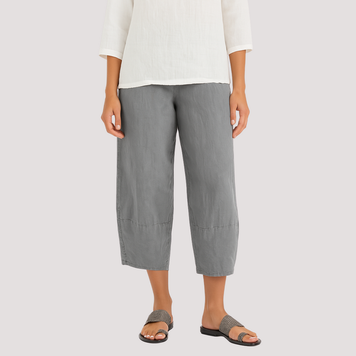 Baggy wide-leg women's summer pants featuring an asymmetric hem, breathable fabric, and ultimate comfort.