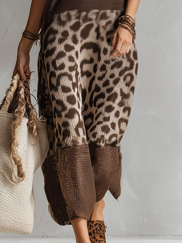 Stylish brown leopard print midi dress for women. Sleeveless design, comfortable fit, perfect for casual elegance.