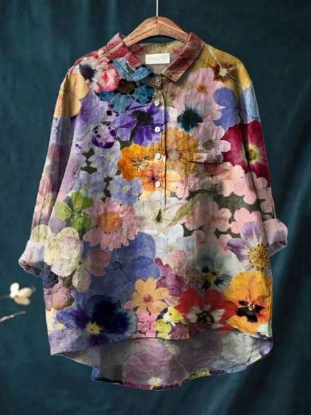 Front view: Beautiful floral pattern women's long sleeve blouse. Flowy & versatile daily wear top.