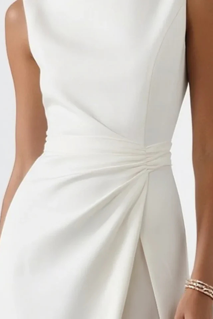 Sleeveless women's elegant evening maxi dress featuring a high side slit & draped waist, suitable for formal events.