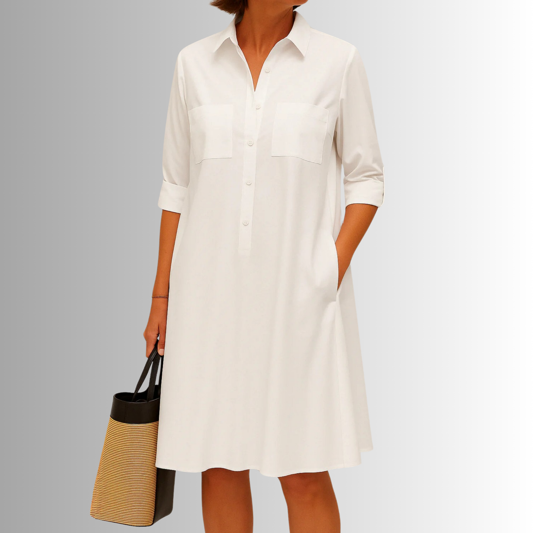 Versatile women's button-front A-line dress with practical pockets and stylish 3/4 sleeves, ideal for spring.