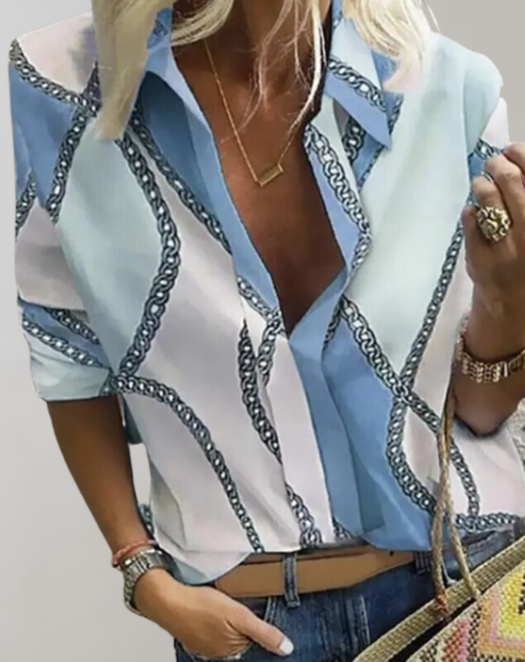 Professional women's long sleeve blouse, an elegant chain print top suitable for office wear and smart casual outfits.
