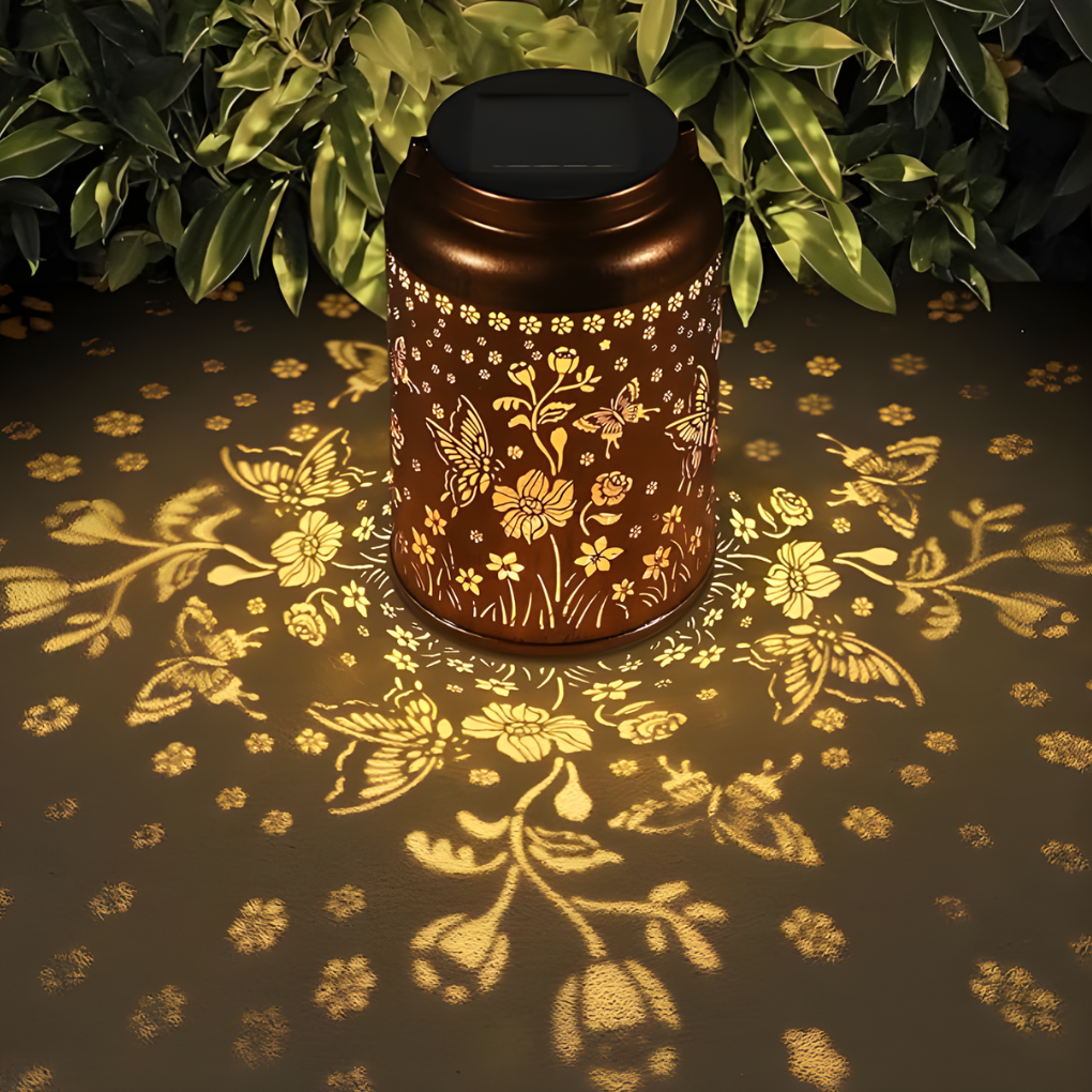 Nature-themed solar garden lantern, a charming accent for outdoor spaces and patios.