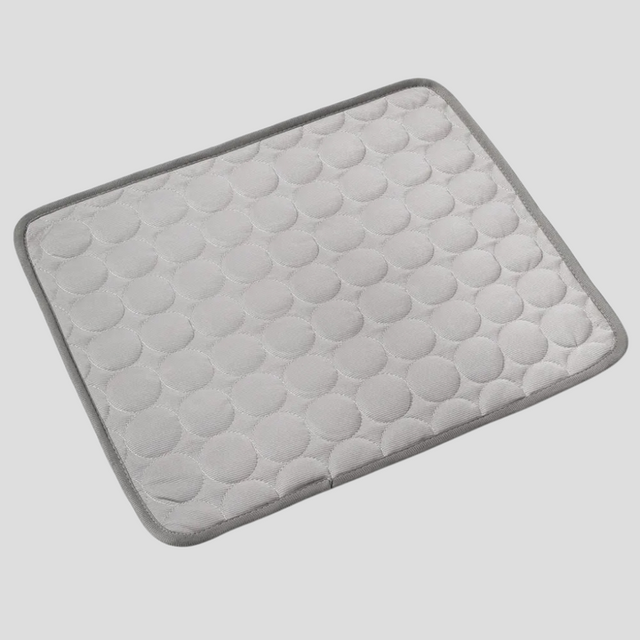 Summer heat relief mat for pets, a self-cooling pad perfect for dogs & cats. Washable & comfortable.