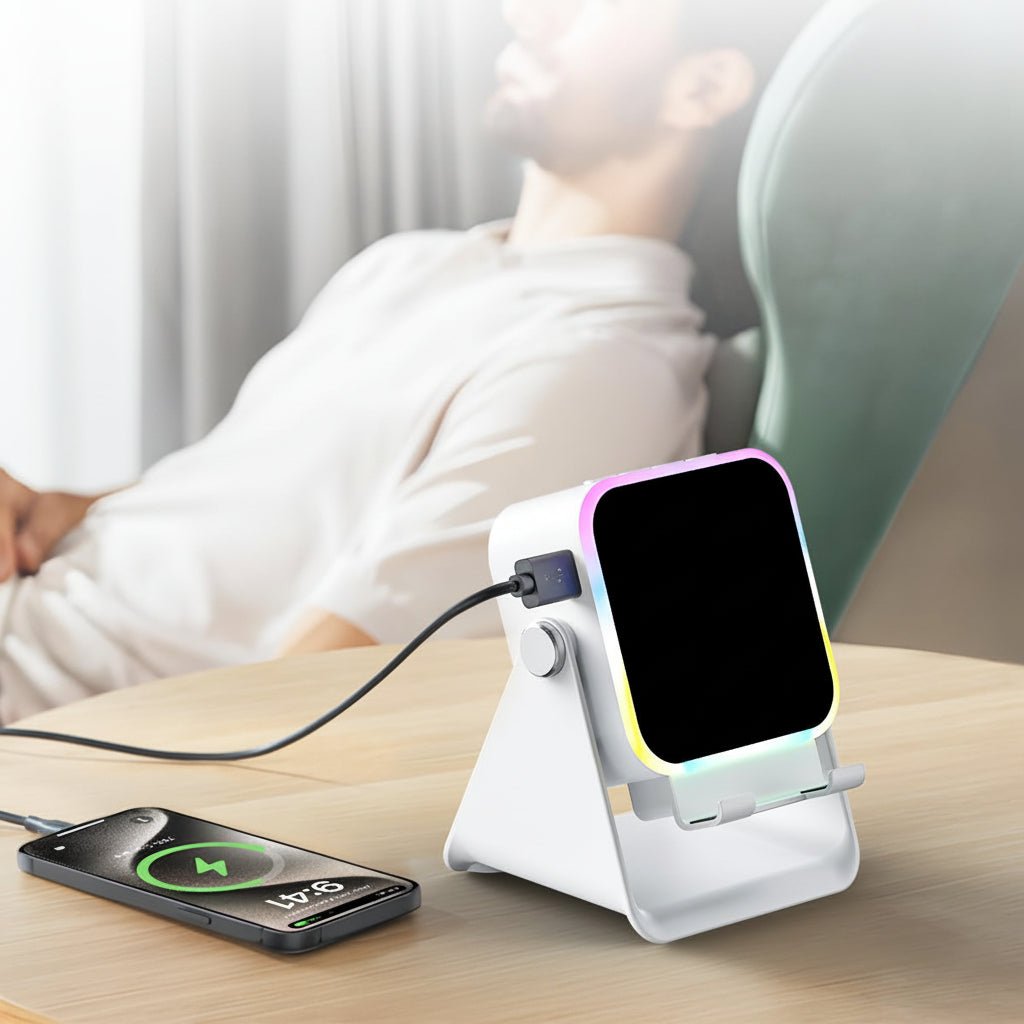 Compact universal speaker dock with integrated phone stand and power bank, ideal for charging and portable audio.