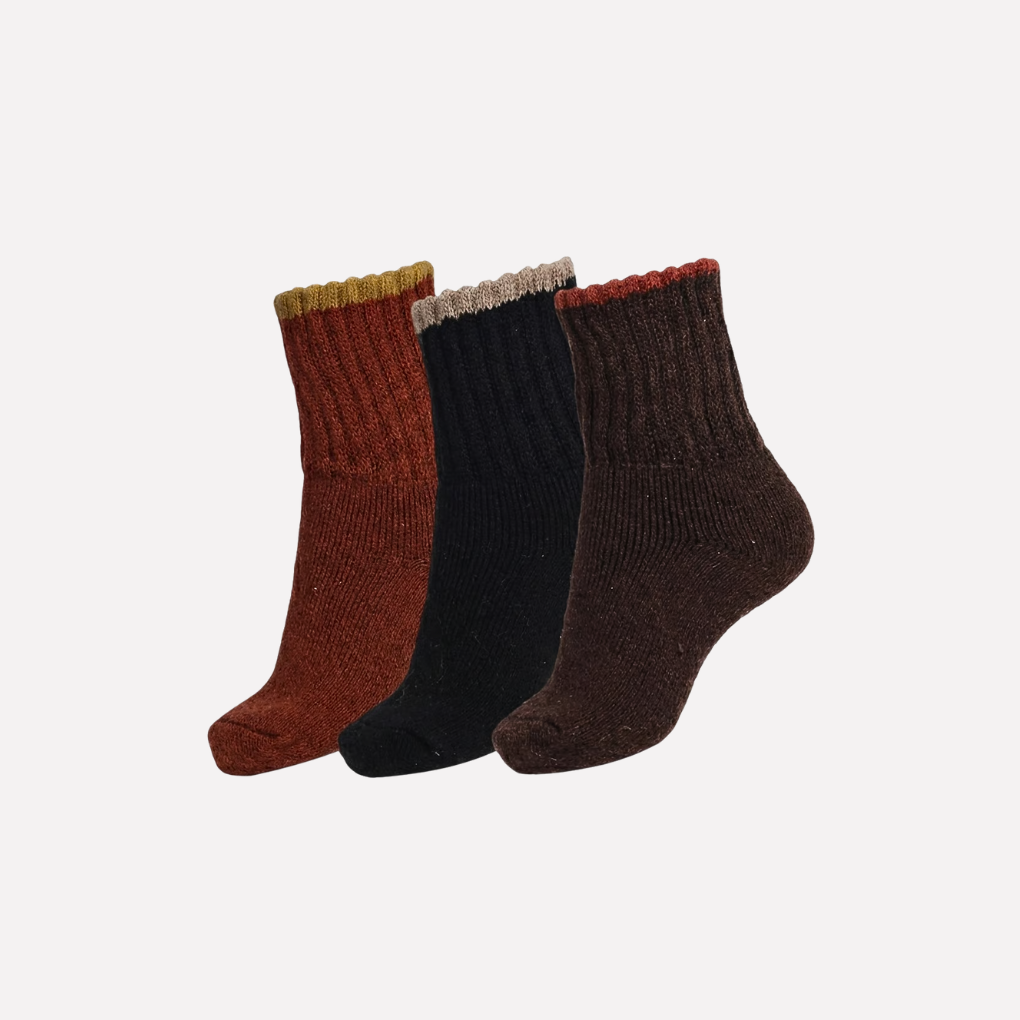 Keep warm with women's thick winter crew socks. Cozy & soft for cold weather adventures or relaxing.