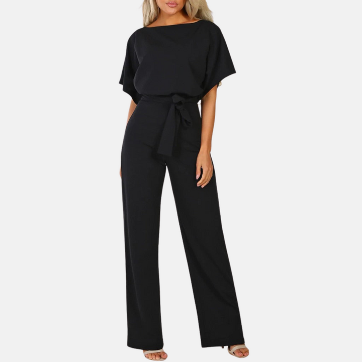 Chic women's elegant wide-leg jumpsuit with short sleeves. High-waisted, solid color romper for summer style.