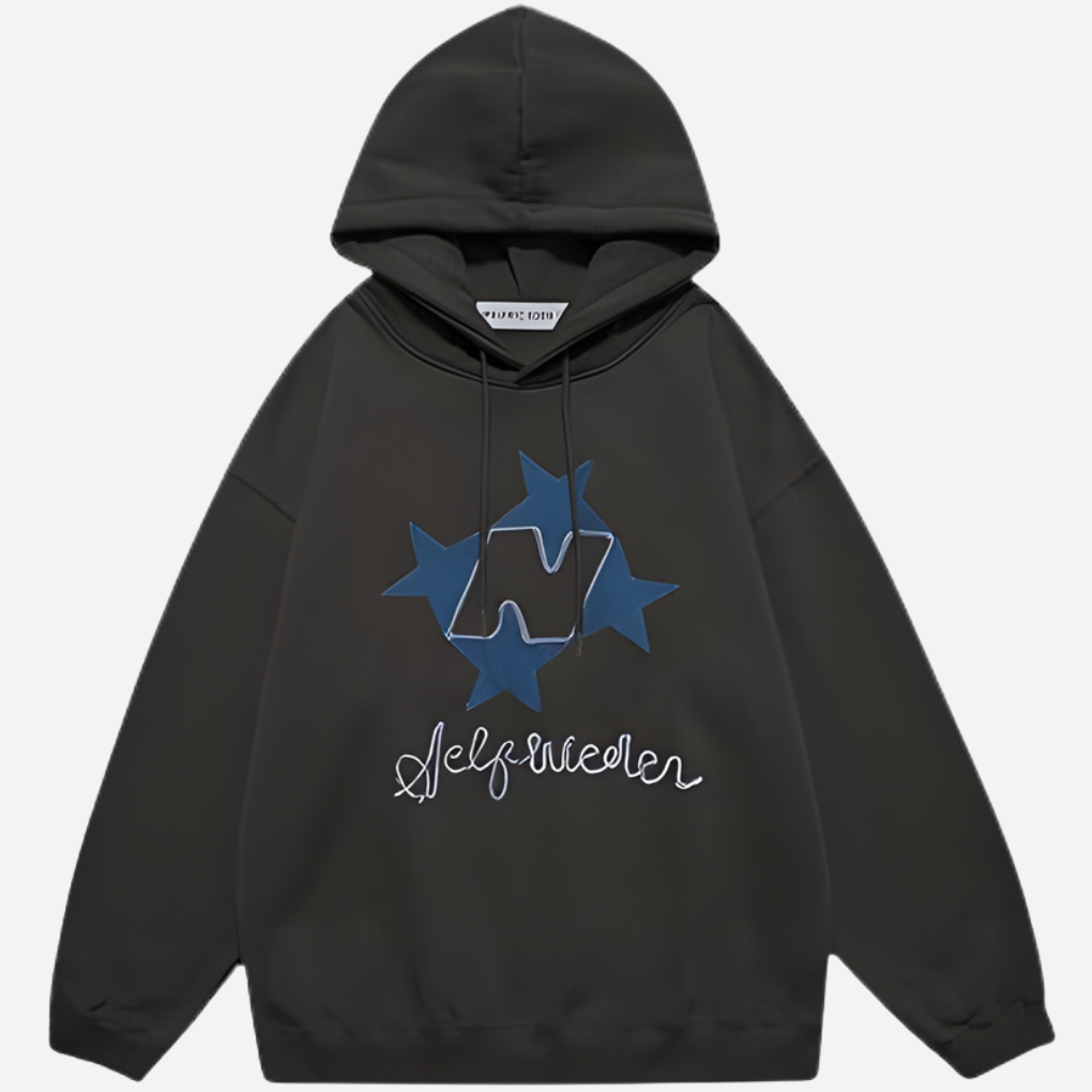 Modern oversized women's hoodie showcasing a large star graphic. Streetwear-ready, comfy pullover.