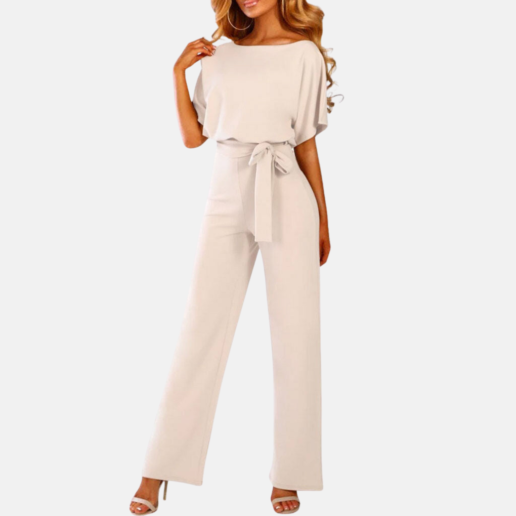 Stylish women's summer wide-leg jumpsuit, solid color, short sleeve, high waist. Elegant day-to-night fashion.
