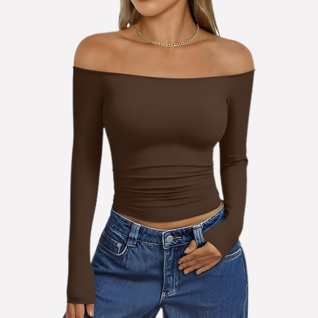 Relaxed fit off-shoulder long sleeve blouse for women, offering a chic and comfortable style.