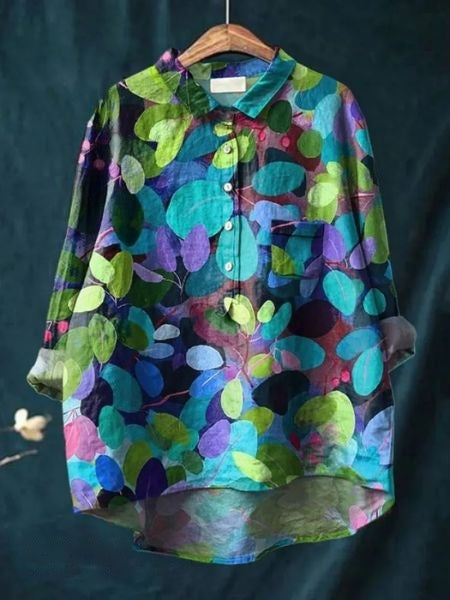 Women's versatile floral blouse with a beautiful print. Elegant long sleeve top for chic fashion.