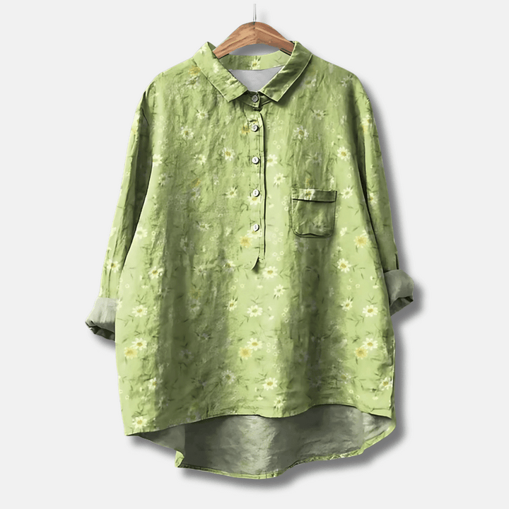 Flowy women's floral print long sleeve blouse. Button-front, loose fit, perfect casual or elegant spring/summer top.