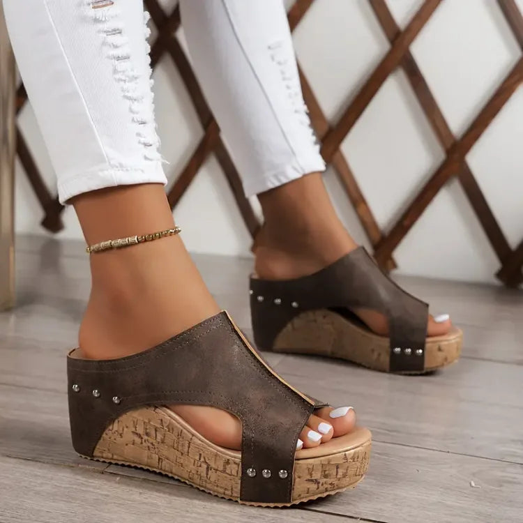 Stylish women's orthopedic wedge sandals offering ultimate comfort, open-toe design, and platform for summer.