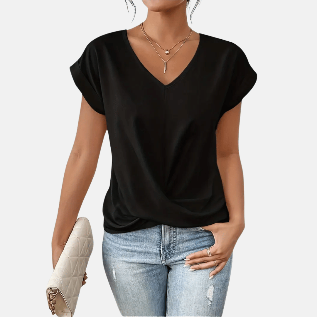 Comfortable women's solid V-neck blouse with a relaxed fit & draped hem. Versatile everyday style.