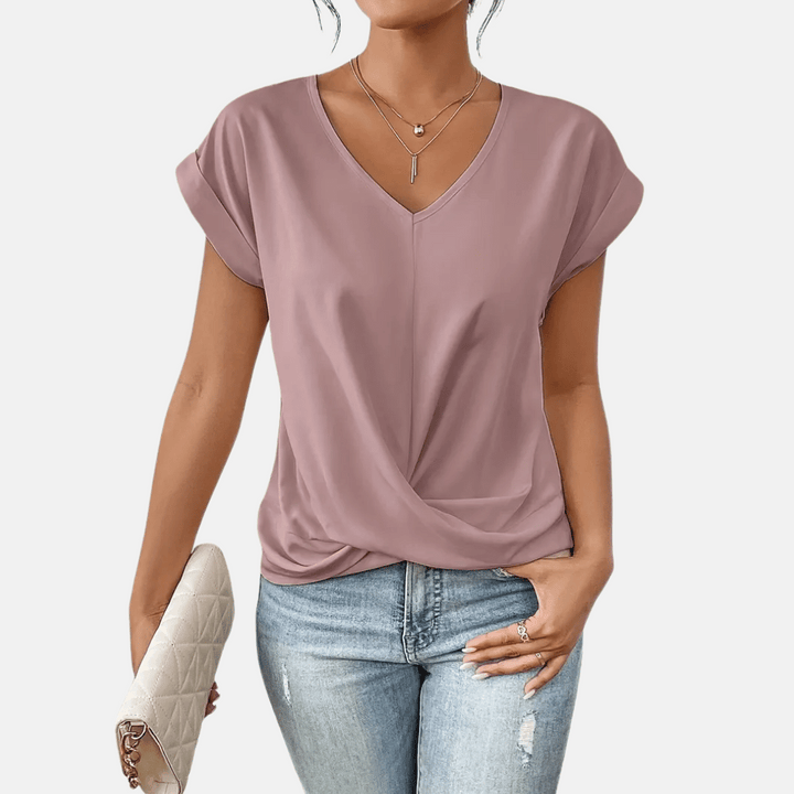 Effortless women's V-neck blouse with a flattering draped hem and short sleeves for summer fashion.