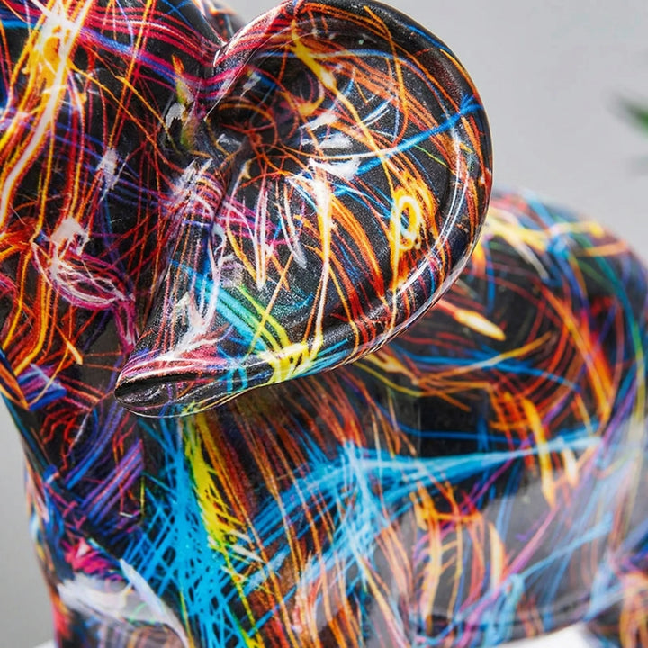 Elegant abstract elephant sculpture, a unique modern tabletop decor gift. Adds contemporary art and vibrant style to any room.
