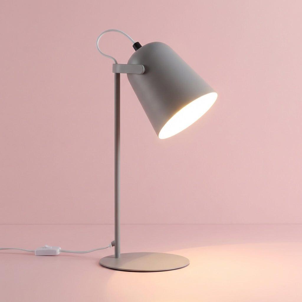 Contemporary Glintor desk lamp with adjustable head, offering targeted illumination for reading & tasks.