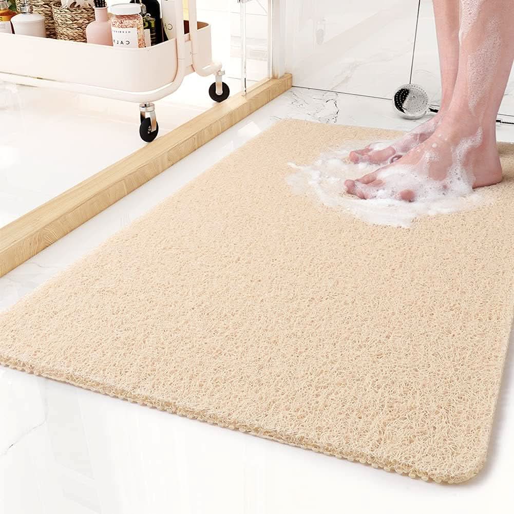 Comfortable non-slip bath mat, featuring hygienic drainage system for bathroom safety & easy cleaning.