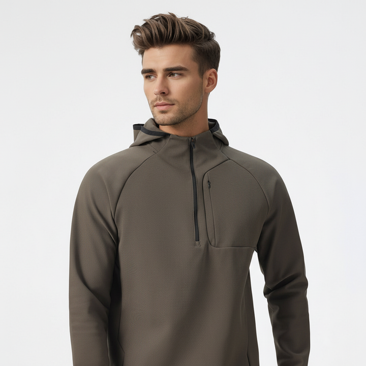 Breathable stretch men's half-zip jacket. Performance activewear for gym, sports, or outdoor activities.