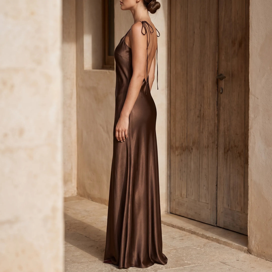 Elegant women's backless floor-length slip dress with V-neck, perfect for evening events and formal wear.