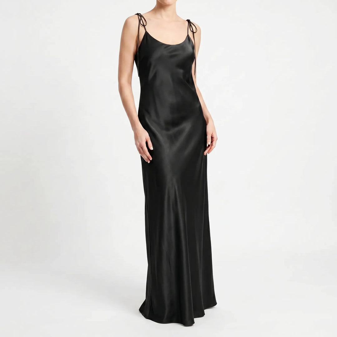 Women's V-neck spaghetti strap backless floor-length slip dress, an elegant formal evening gown.