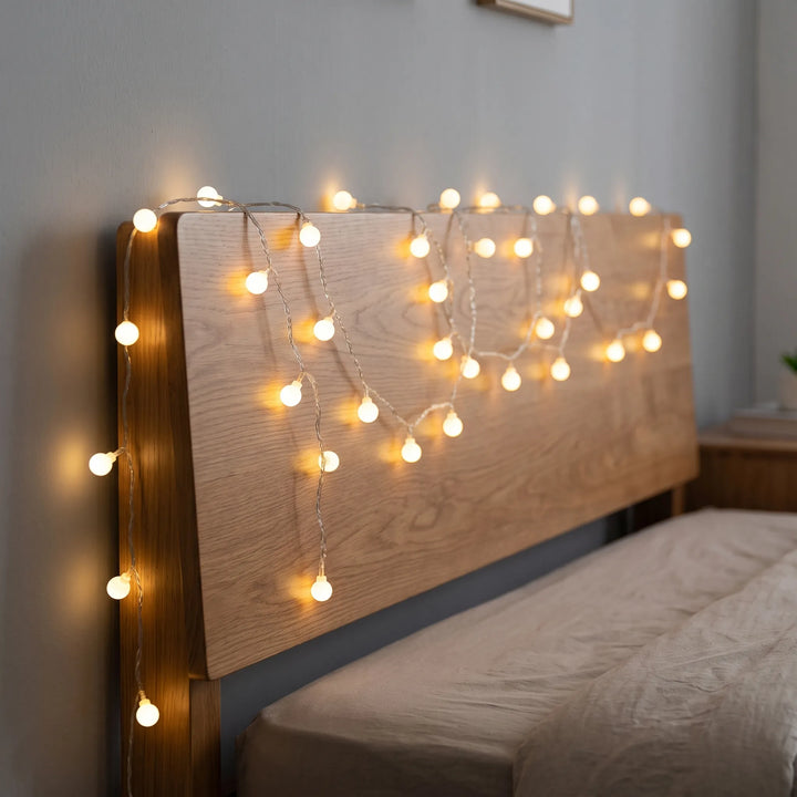 LED globe string lights for cozy indoor/outdoor ambient decor & party lighting.