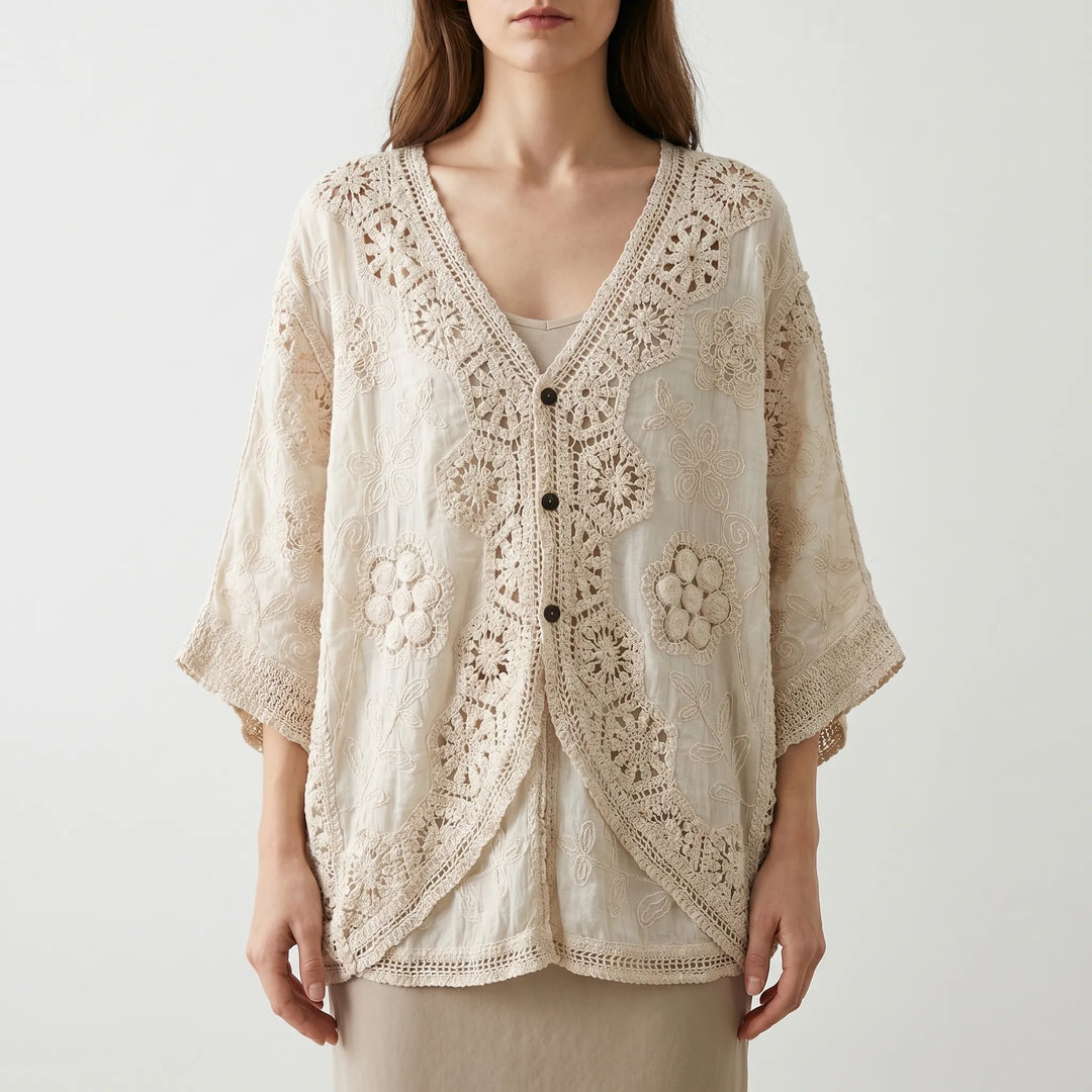 Loose fit women's bohemian crochet cardigan with button front, ideal for layering on summer days.