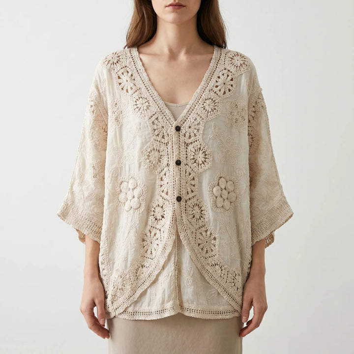 Loose fit women's bohemian crochet cardigan with button front, ideal for layering on summer days.