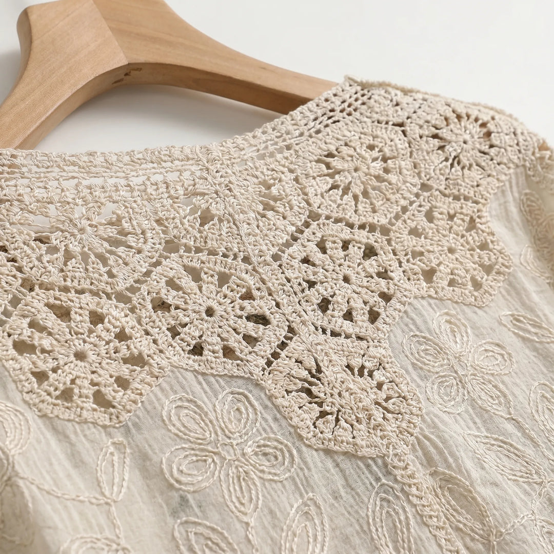 Stylish women's bohemian crochet cardigan, a lightweight and airy summer essential with a casual feel.