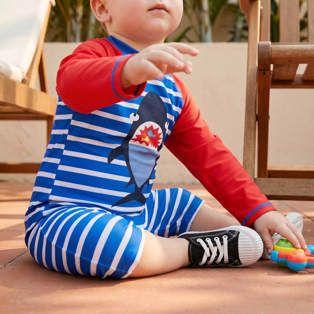 Boys' cartoon print swimwear set with sun hat. UPF 50+ sun protection, quick-dry fabric for beach & pool.